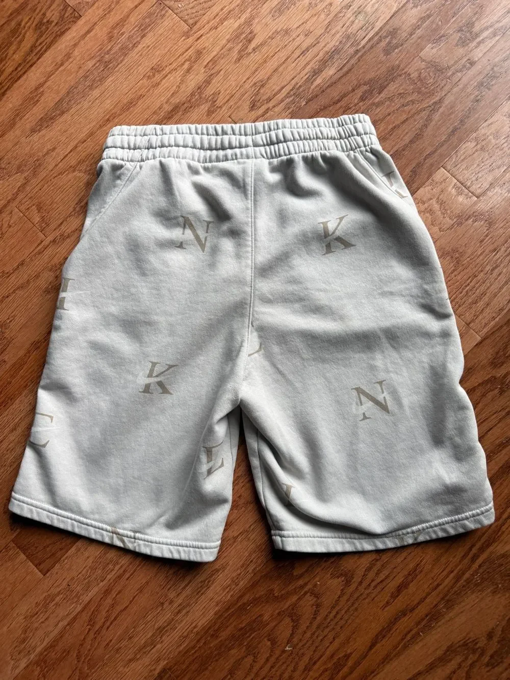 Nike boys shorts, cotton, tan with letters and checks, youth XL (14-16)